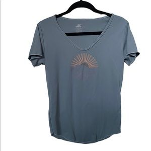 O’Neill Light Blue Sun Graphic Scoop Neck Tee Shirt W/50+ UPF Size Medium.